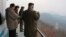 Kim Jong-Un inspectînd locul de lansare al unei noi rachete