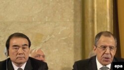 لی بائودونگ(چپ) سفیر چین در سازمان ملل در کنار سرگئی لاوروف (راست) وزیر خارجه روسیه