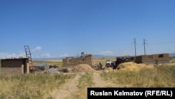 Жаңы курулуп жаткан үйлөр.