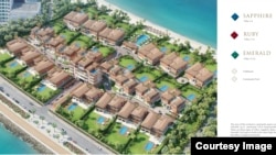 A brochure shows a representation of the XXII Carat complex in Dubai