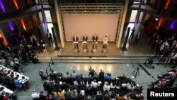 Лидер ХДС Фридрих Мерц, лидер ХСС Маркус Зедер, лидеры СДПГ Саски Эскен и Ларс Клингбейль во время пресс-конференции после достижения соглашения о создании коалиционного правительства, Берлин, Германия, 9 апреля 2025 года