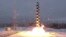 Russia's new Sarmat intercontinental ballistic missile blasts off during a test launch from an undisclosed location in Russia.