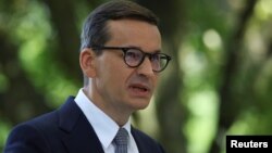 Primul ministru al Poloniei, Mateusz Morawiecki. Aici la Varșovia, la 11 septembrie 2021, în timpul unei întâlniri cu cancelarul german Angela Merkel. Foto: REUTERS