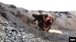 FILE: A Laborer works at a coal mine in the southwestren province Balochistan.