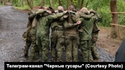 Военнослужащие бригады "Чёрные гусары" перед боем, май 2025 года. 