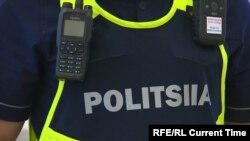 Казакстан полициясынын жаңы формасындагы жазуу.