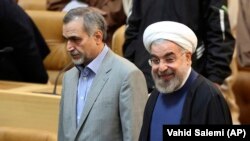 Iranian President Hassan Rohani (right) and his brother Hossein Fereidoun (file photo)