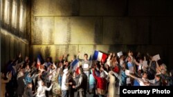 One of the "We [too] are the nation" campaign posters -- echoing a Jacques-Louis David painting that depicts a key meeting in the run-up to the French Revolution -- mounted in the Paris Metro.