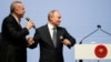 TURKEY -- Turkish President Tayyip Erdogan (L) and his Russian counterpart Vladimir Putin attend a ceremony marking the completion of the sea part of the TurkStream gas pipeline in Istanbul, November 19, 2018