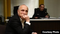 Georgia - Georgia's former Prime Minister Vano Merabishvili arrives for questioning at on Interior Ministry building in Tbilisi, 07Dec2012