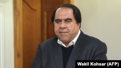 Keramuddin Karim looks on ahead of an interview with AFP in Kabul in December 2018.