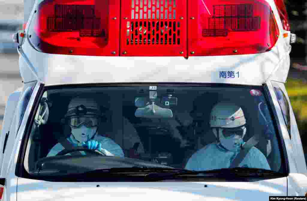 Ambulance workers carry a person from the cruise ship Diamond Princess after 10 people on board tested positive for the coronavirus in Yokohama, south of Tokyo, Japan.&nbsp;