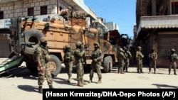 Турецькі солдати у центрі Афріну у березні 2018 року