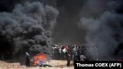 Сутички між палестинцями й ізраїльською армією на кордоні в Смузі Гази, 14 травня 2018 року 