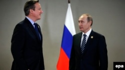 Președintele Vladimir Putin cu premierul David Cameron la summitul G20 summit la Antalya, în 2015