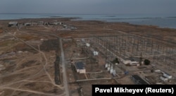A drone view shows an electrical substation and the village of Ulken on the eve of the referendum on the construction of a nuclear power plant, in the Almaty region, Kazakhstan, on October 5, 2024.