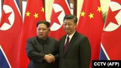 دیدار شی جینگ‌پینگ رئیس جمهور چین و کیم جونگ اون رهبر کره شمالی در تاریخ ۲۷ مارس در شهر پکن 