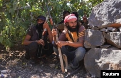 Неизвестные вооруженные боевики на окраине города Эс-Сувайда. Сирия, 15 июля 2025 года