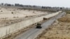 A military vehicle patrols in southeastern Iran next to the country's border with Afghanistan.