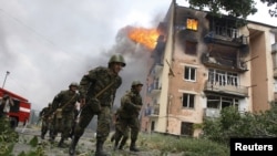 Грузинські солдати ховаються від російського обстрілу міста Ґорі. 9 серпня 2023 року