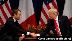Эммануэл Макрон менен Доналд Трамп. 