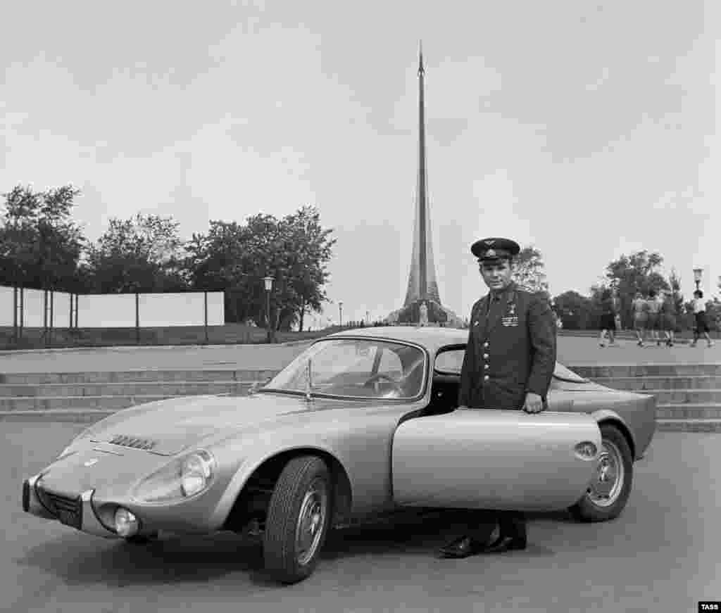 Soviet Union -- Yury Gagarin stands next to a Matra car in Moscow, 30Jul1965 - 1965/07/30 Title ENG: Yuri Gagarin, 1965 Title Rus: Юрий Гагарин, 1965 год Byline: Мастюков Валентин Caption ENG: Moscow. USSR. Soviet cosmonaut Yuri Gagarin standing near a Matra sports car. Photo TASS / Valentin Mastyukov  gagarin0411