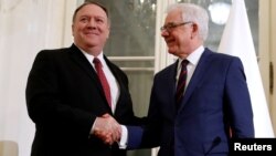 АКШнын мамлекеттик катчысы Майк Помпео менен Польшанын тышкы иштер министри Яцек Чапутович. 12-февраль, 2019-жыл. 