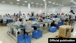 «Бишкек» эркин экономикалык аймагындагы компаниялардын жумушчулары. Иллюстрациялык сүрөт.