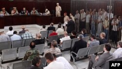 Падчас суду над усходнеэўрапейцамі ў Лібіі, студзень 2012