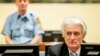 Ex-Bosnian Serb leader Radovan Karadzic sits in the court of the International Criminal Tribunal for former Yugoslavia (ICTY) in The Hague, the Netherlands March 24, 2016. REUTERS/Robin van Lonkhuijsen/Pool/File Photo