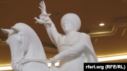 A statue of Turkmen President Gurbanguly Berdymukhammedov astride his horse in the attire of a traditional tribal chief.