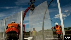 ساخت دیوار برای جلوگیری از ورود پناهجویان به تونل مانش