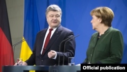 Петро Порошенко і Анґела Меркель 