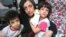 Iranian human rights activist, Narges Mohammadi with her children Ali (center) and Kiana