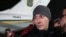 Донеччанин, журналіст Станіслав Асєєв у день обміну утримуваними особами. Аеропорт «Бориспіль», 29 грудня 2019 року. Асєєв перебував у полоні в Донецьку понад 2,5 роки