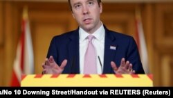 Ministar zdravlja Velike Britanije Mat Henkok na konferenciji u Dauning stritu u Londonu 10. aprila