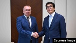 Валерий Жовтенко менен Эдил Байсалов. 