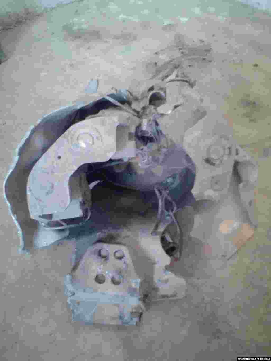 Another part of the projectile weapon that struck his car.