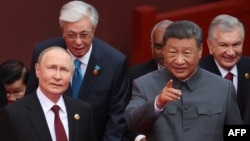 Ruski predsednik Vladimir Putin i kineski lider Si Đinping uoči vojne parade na Trgu Tjenanmen u Pekingu, 3. septembar 2025.