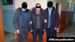 Шектүүнү кармоо учуру. УКМКнын сүрөтү.