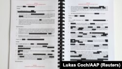 Pjesë të redaktuara të raportit mbi vrasjen e pretenduar të civilëve nga ana e trupave australiane në Afganistan. 