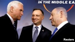 U.S. Vice President Mike Pence (left to right), Polish President Andrzej Duda, and Israeli Prime Minister Benjamin Netanyahu talk at the Middle East conference in Warsaw on February 13.
