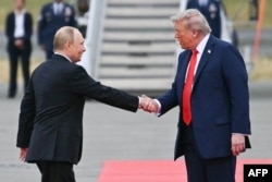 Дональд Трамп і Володимир Путін в Анкориджі, Аляска, 15 серпня 2025 року