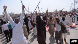 Pakistani supporters of convicted murderer Mumtaz Qadri shout slogans during an anti-government protest in Islamabad in March 2016.
