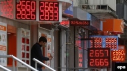 В ходе обсуждения госбюджета в парламенте вопросы оппозиции в основном касались возможной нестабильности цен на фоне перманентной девальвации лари