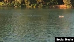 Саҳнаи наҷоти зан ва кӯдак аз рӯдхонаи Кубан.