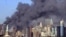 Smoke billows out of the burning World Trade Center towers before their collapse in New York on September 11, 2001.