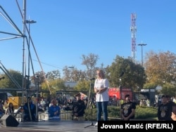 Dijana Hrka, the mother of one of the victims, addresses the commemoration event in Novi Sad on November 1.