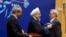 Abdolrasoul Dorri Esfahani (right) was honored by President Hassan Rohani on February 8, 2016, for his role in the landmark nuclear negotiations.