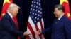 US President Donald Trump and Chinese leader Xi Jinping greet each other as they arrive for talks in Busan on October 30.